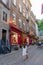 Quebec City, QC/CAN - 07-18-2017: Tourists walking down cobblestone street visiting shops in Old Quebec