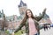 Quebec City scape with Chateau Frontenac and young teen enjoying the view.