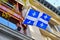 A Quebec flag with white lily flowers in Montreal, Canada