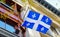 A Quebec flag with white lily flowers in Montreal, Canada