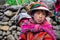 Quechua boy with sister in a village in the Andes, Ollantaytambo, Peru