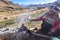 A Quechua lady dyes Alpaca Wool for textile making. Chillca, Cusco, Peru