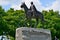 The Queen Elizabeth II Equestrian statue is located between the Center Block