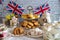 Queen Elizabeth II Platinum Jubilee cream tea street party food red white and blue flags  with celebration Union jack food toppers