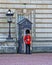 Queen Guard at his post at Buckingham Palace in London