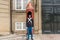 Queen`s Royal Guard holding a gun on his hand in the gate Amalienborg Palace in Copenhagen, Danmark