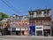 Queen Street in downtown Toronto preserves the ornate facades of 19th century buildings, with an eclectic range of shops