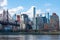 Queensboro Bridge along the East River with the Midtown Manhattan and Roosevelt Island Skyline in New York City