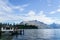 Queentown / New Zealand - 2 December 2017: water observatory office and small ship harbour at lake side in sunny day