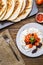 Quesadilla, salad with cottage cheese and tomatoes on wood table.