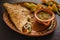 Quesadillas with squash blossom, cheese and sauce mexican food