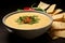 Queso Dip: Melted Cheese Delight with Tomatoes and Green Chilies