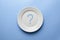 Question mark on empty plate. Diet choice or healthy meals. Vegetarian or meat eating. Waiting for order in restaurant