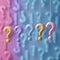 Question marks hanging on gradient background seeking answers concept