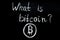 Question `what is bitcoin` on chalkboard