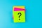 Questions Mark  ?  word in paper note on blue background. FAQ frequency asked questions, Answer, Q&A, Communication and