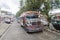 QUETZALTENANGO, GUATEMALA - MARCH 21, 2016: Colourful chicken buses, former US school buses, ride in Quetzaltenango cit