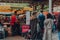Queue at Change Please coffee stall inside Borough Market, London, UK