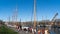 A queue of moored sailing ships in the port of Enkhuizen