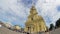 The queue at the Orthodox church, clouds ove the spire of St. Peter and Paul Cathedral in Saint Petersburg, Russia