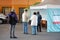 Queue to free vaccination kiosk located near subway entrance