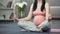 Quick with child lady doing yoga for pregnant, getting body toned, meditation