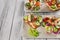 Quick and healthy recipes. Salmon salad with sesame dressing on Italian ciabatta bread. Mediterranean cuisine. Copy space