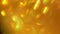 Quick movements of the flickering background. Blurred texture of golden radiance. Seamless texture with yellow gold