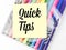 Quick tips written on yellow paper note with colorful pen.