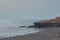 Quiet beach fishing in Ajuy with people bathing and sunbathing, Fuerteventura