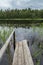 Quiet and calm lake and a wooden pier in Finland