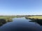 Quiet canal around tersoal in Friesland