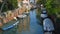 Quiet canal with boats Venice.