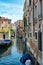 Quiet canal scene in Venice Italy