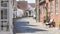 Quiet empty European cobble stone street in the morning