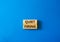 Quiet firing symbol. Concept word Quiet firing on wooden blocks. Beautiful blue background. Business and Quiet firing concept.