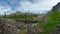 A quiet lake among rocks and dense taiga