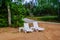 Quiet location on the sandy beach between the trees with two lounge chairs, you can escape and relax