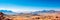 Quiet mountain plateaus with expansive vistas, clear skies, and rocky outcrops.