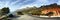Quiet mountain road beside the coastline in South Africa. Panorama view of an empty mountain pass near the sea in Cape