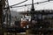 A quiet passage stands on the water in Slavyanka Bay with a ship being repaired in it.