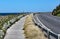 Quiet and peaceful coast road and wooden boardwalk near Wellington, New Zealand