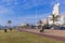 Quiet Promenade on Golden Mile Beachfront Against Cty Skyline