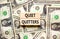 Quiet quitters symbol. Concept words Quiet quitters on wooden blocks. Beautiful background from dollar bills. Dollar bills.