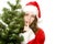 Quiet Santa Claus Woman beside Christmas fir tree