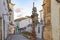 Quiet street with church, houses and lantern