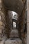 Quiet streets of Jerusalem. A passage with steps connecting two streets in old city of Jerusalem, Israel