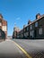 Quiet Tarmac Asphalt Road with Yellow Line under Blue Sky during Lockdown in Newark, UK