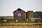 Quilt barn in Delavan, Wisconsin with cement wall and silo