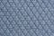 Quilted fabric blue denim cloth element texture close up background